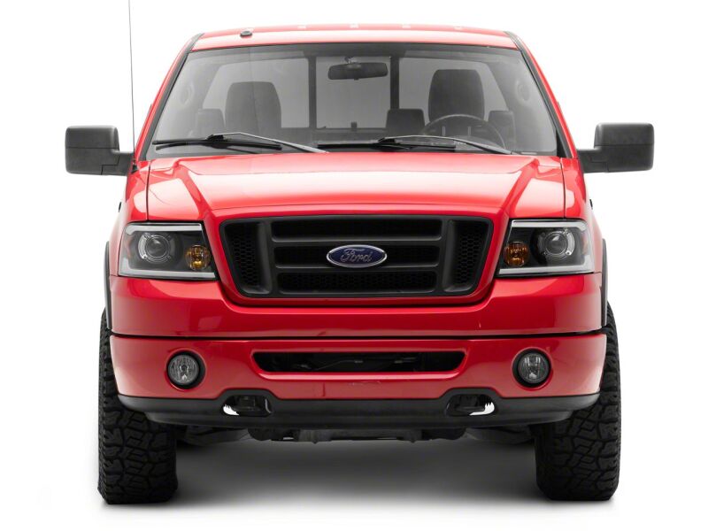 Raxiom 04-08 Ford F-150 Axial Series Projector Headlights with LED Bar- Black Housing- Clear Lens - T566363 for 2004-2008 Ford F 150 - close-up view 2