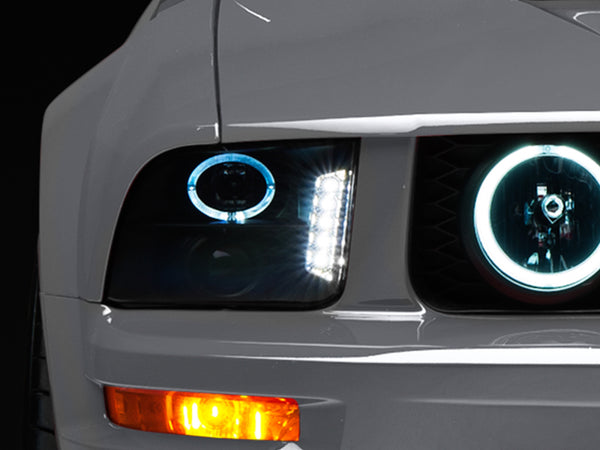 Raxiom 05-09 Ford Mustang w/ Halogen LED Halo Prjctr Headlights-Blk Hsng(Smoked Lens Exclude GT500) - 49128 for 2005-2009 For