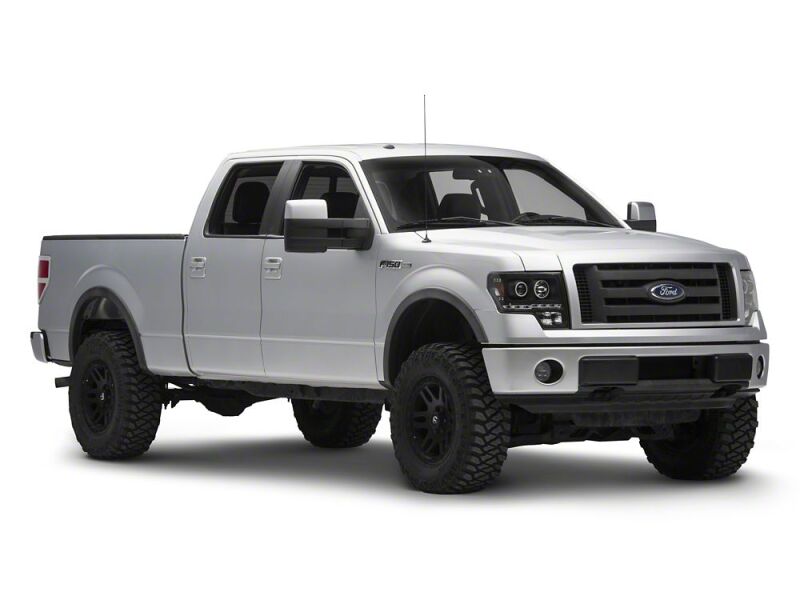 Raxiom 09-14 Ford F-150 G2 Super White LED Halo Projector Headlights- Black Housing- Clear Lens - T542835 - close-up view
