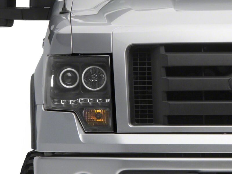 Raxiom 09-14 Ford F-150 G2 Super White LED Halo Projector Headlights- Black Housing- Clear Lens - T542835 - close-up view 2