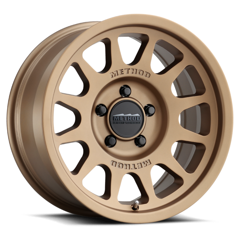 Method MR703 17x8.5 +25mm Offset 5x5 71.5mm CB Method Bronze Wheel - MR70378550925 by Method Wheels - angle view