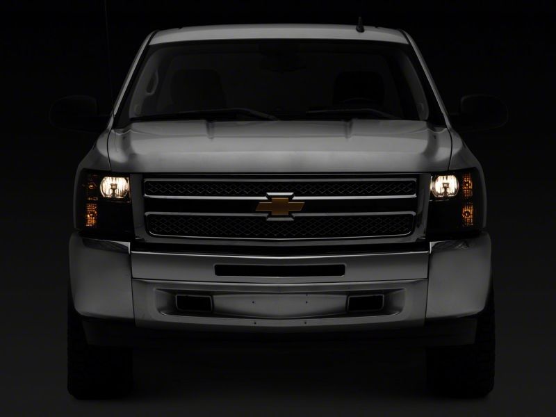 Raxiom 07-14 Chevrolet Silverado 1500 HD Axial OEM RepHeadlights- Chrome Housing- Smoked Lens - S122324
