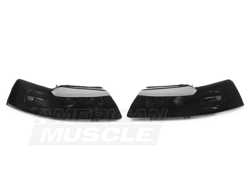 Raxiom 99-04 Ford Mustang Axial Series Projector Headlights- Blk Housing (Smoked Lens) - 49126