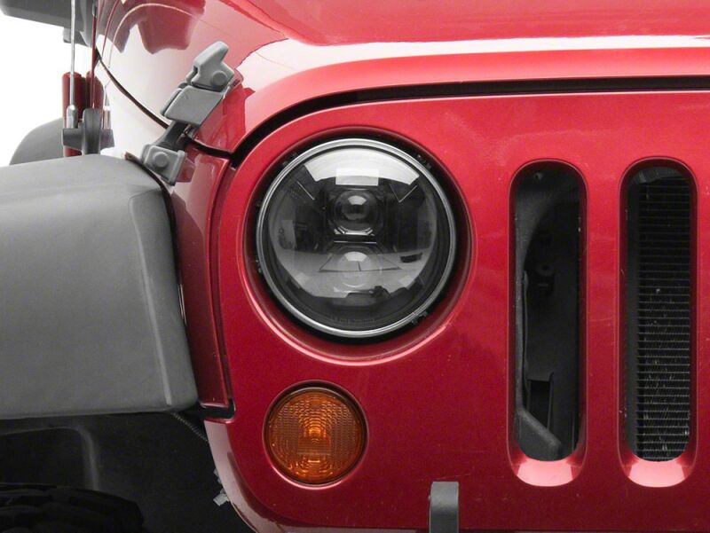 Raxiom 07-18 Jeep Wrangler JK Axial Series DB2 LED Headlights- Black Housing- Clear Lens - J181075 - close-up view 4