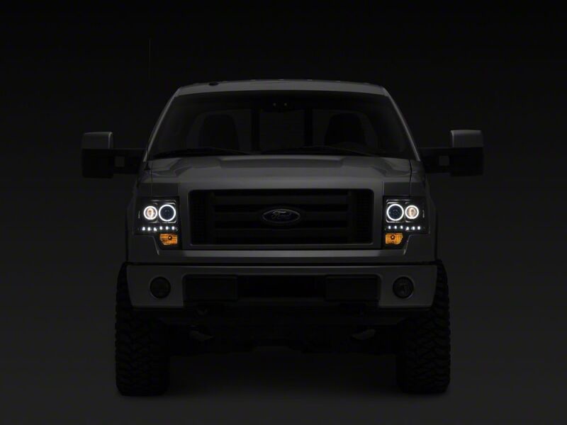 Raxiom 09-14 Ford F-150 G2 Super White LED Halo Projector Headlights- Black Housing- Clear Lens - T542835 - close-up view 3