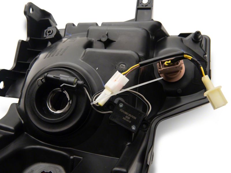 Raxiom 09-14 Ford F-150 Axial Series Headlights w/ LED Bar- Blk Housing (Clear Lens) - T566367