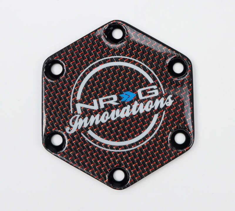 NRG Carbon Fiber w/ Red Texalium Fabrics Horn Delete Button Circular Logo Front/ Back - STR-640CF/RD - close-up view