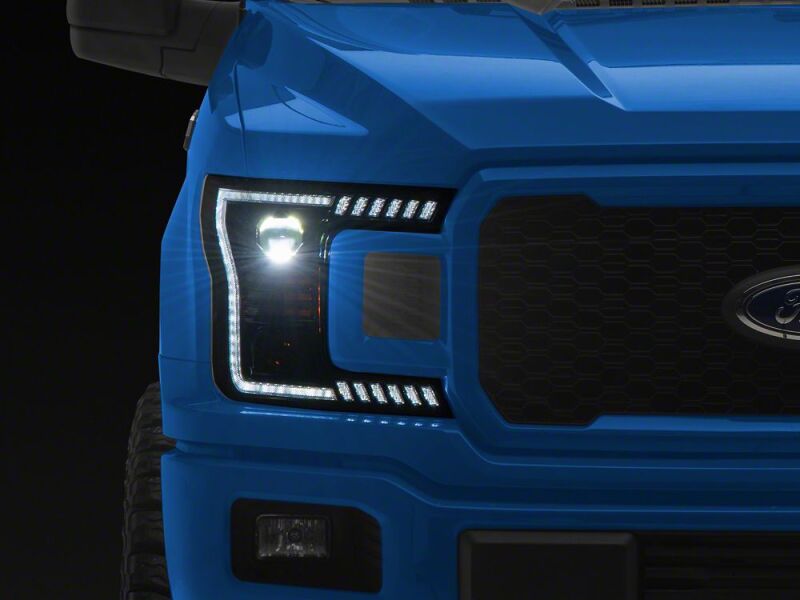 Raxiom 18-20 Ford F-150 LED Halo Surround Headlights with White DRL- Black Housing- Clear Lens - T583569 - front view