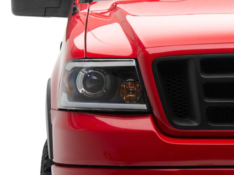 Raxiom 04-08 Ford F-150 Axial Series LED Proj Headlights/Seq LED Bar- Black- Clear Lens - T566366 - close-up view 4