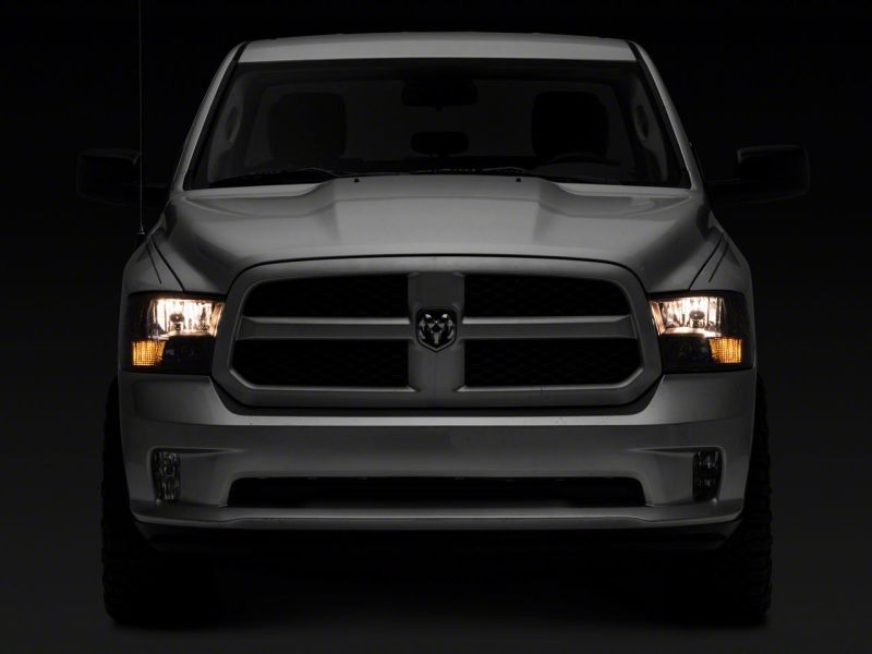 Raxiom 09-18 Dodge RAM 1500 Axial Series Euro Style Headlights w/ Dual Bulb Blk Housing (Clear Lens) - R118016