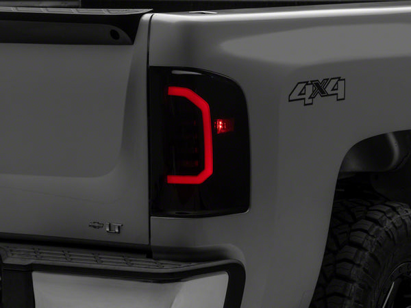 Raxiom 07-14 Chevrolet Silverado 1500 Axial Series LED Tail Lights- Blk Housing (Smoked Lens) - S150366 for 2007-2014 Chevrol