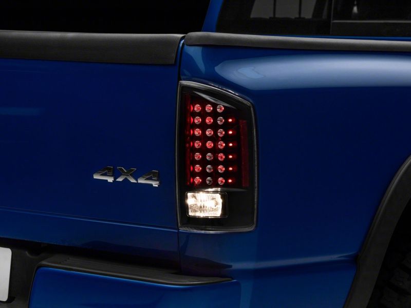 Raxiom 07-08 Dodge RAM 1500 LED Tail Lights- Blk Housing (Clear Lens) - R110152