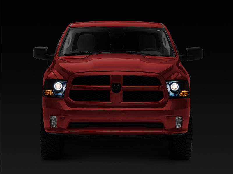 Raxiom 09-18 RAM 1500 Super White LED Halo Projector Headlights- Black Housing (Clear Lens) - R110150