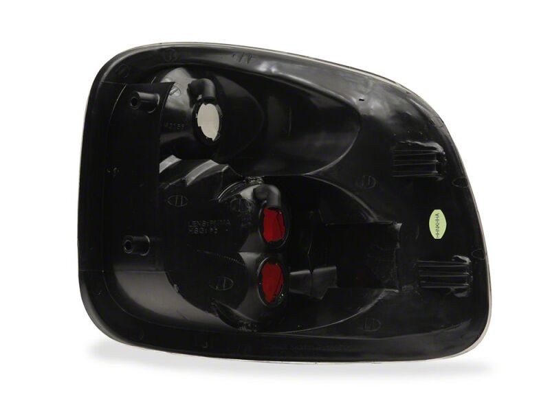 Raxiom 97-00 Ford F-150 Flareside Axial Series Altezza Style Tail Lights- Black- Clear Lens - T598100 - close-up view 2