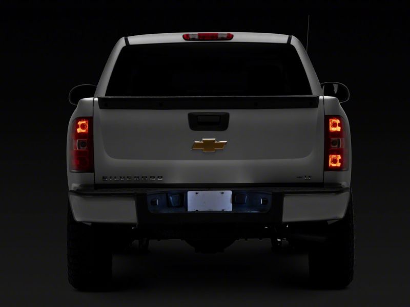 Raxiom 99-14 Chevrolet Silverado Axial Series LED License Plate Lamps - S155419