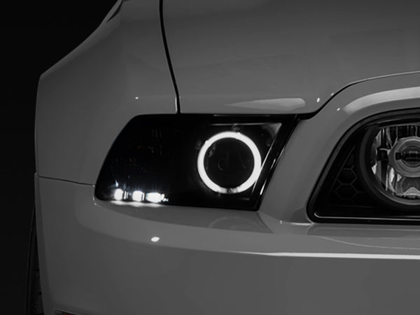 Raxiom 13-14 Ford Mustang w/ Factory HIDLED Halo Projector Headlights- Black Housing (Smoked Lens) - 49170 for 2013-2014 Ford