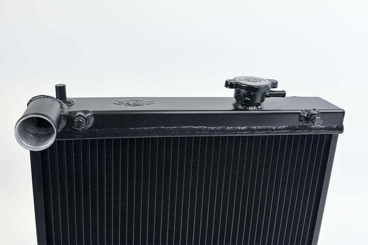 CSF 03-07 Mitsubishi Lancer EVO 7/8/9 1/2 Size Radiator - Black - 7228B