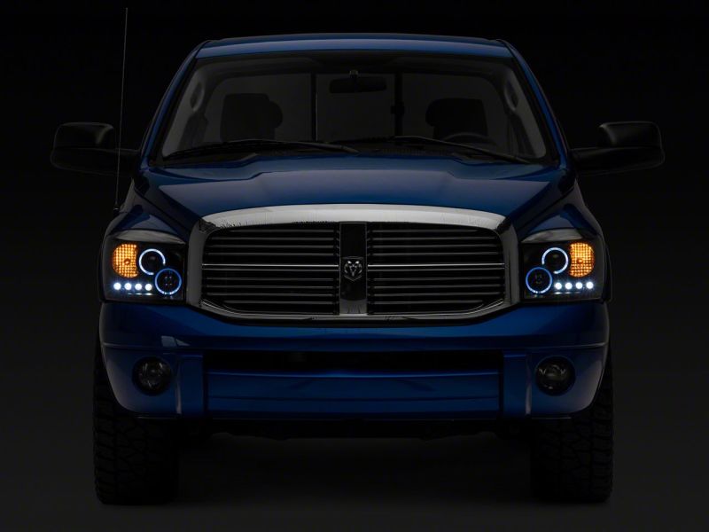 Raxiom 06-08 Dodge RAM 1500 LED Halo Projector Headlights- Blk Housing (Clear Lens) - R110149