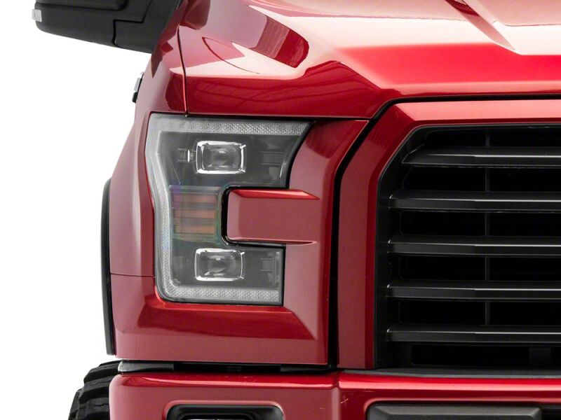 Raxiom 15-17 Ford F-150 LED Projector Headlights with LED Amber DRL- Black Housing- Clear Lens - T558778 - close-up view 3