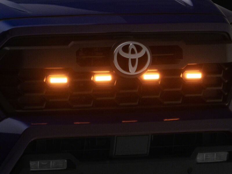 Raxiom 24-26 Toyota Tacoma Pre Runner/ TRD Off-Road/ TRD Sport Amber LED Grille Light- Clear Lens - TT65013 - rear view