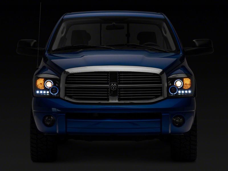 Raxiom 06-08 Dodge RAM 1500 LED Halo Projector Headlights- Blk Housing (Clear Lens) - R110149