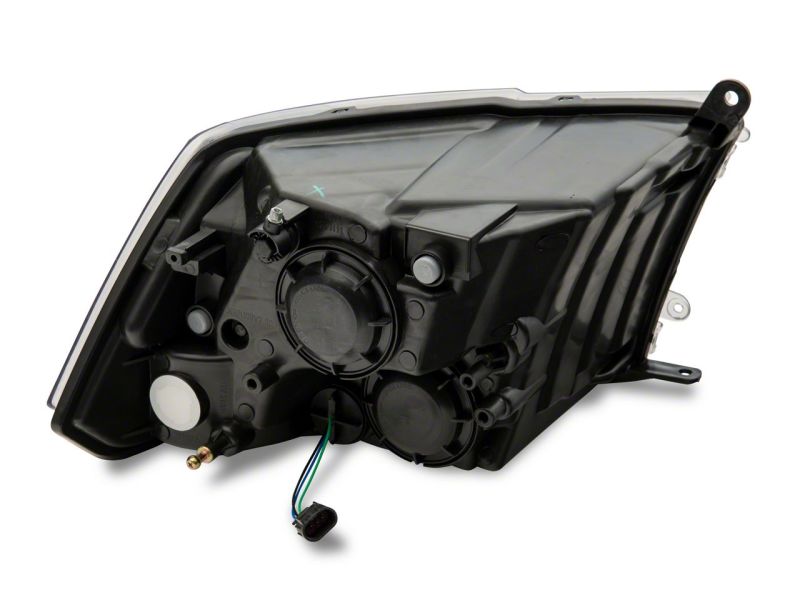 Raxiom 09-18 Dodge RAM 1500 Axial Series Euro Style Headlights w/ Dual Bulb Blk Housing (Clear Lens) - R118016