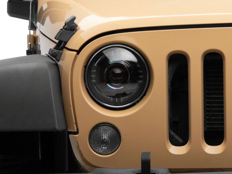 Raxiom 07-18 Jeep Wrangler JK Axial Series Quatro LED Headlights- Black Housing- Clear Lens - J194501 - close-up view 7