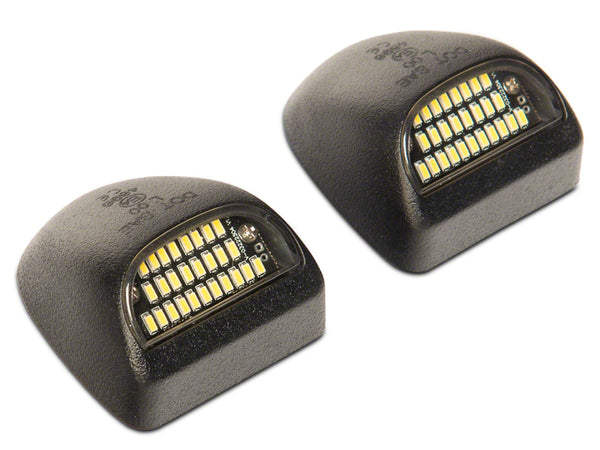 Raxiom 99-14 Chevrolet Silverado Axial Series LED License Plate Lamps - S155419 for 1999-2013 Chevrolet Silverado 1500 - fron