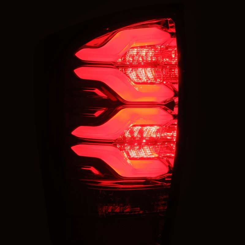 AlphaRex 16-21 Toyota Tacoma LUXX LED Taillights Blk/Red w/Activ Light/Seq Signal - 680000