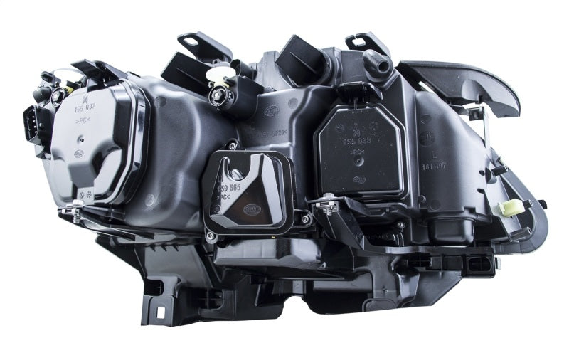 Hella 02-07 BMW 7 Series Bi-Xenon Headlight Left Clear Turn Signal - 009044531