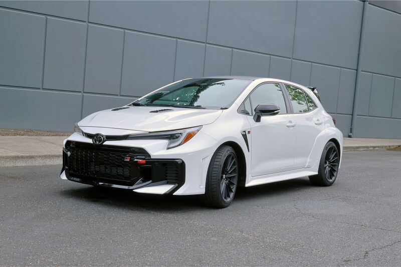 PERRIN 23-26 Toyota GR Corolla Front Tow Hook - Red - PTP-BDY-231RD by Perrin Performance - installed view