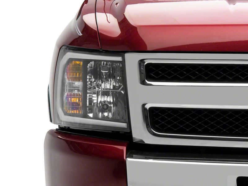 Raxiom 07-13 Chevrolet Silverado 1500 Axial Series Headlights w/ LED Bar- Blk Housing (Clear Lens) - S138003