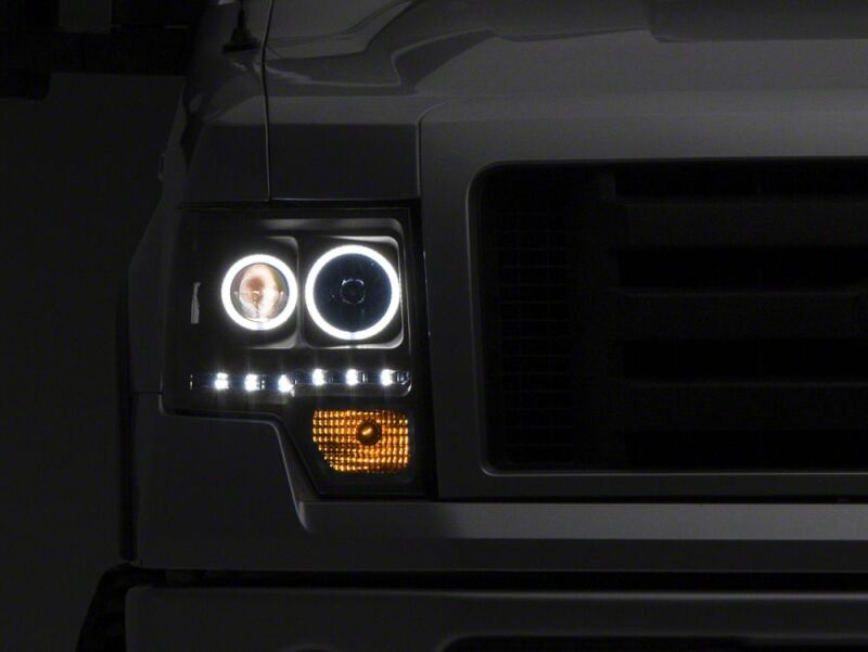 Raxiom 09-14 Ford F-150 G2 Super White LED Halo Projector Headlights- Black Housing- Clear Lens - T542835 - front view