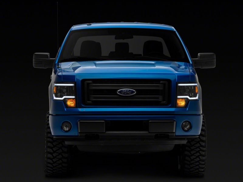 Raxiom 09-14 Ford F-150 Axial Series Headlight w/ SEQL LED Bar- Blk Housing (Clear Lens) - T566368