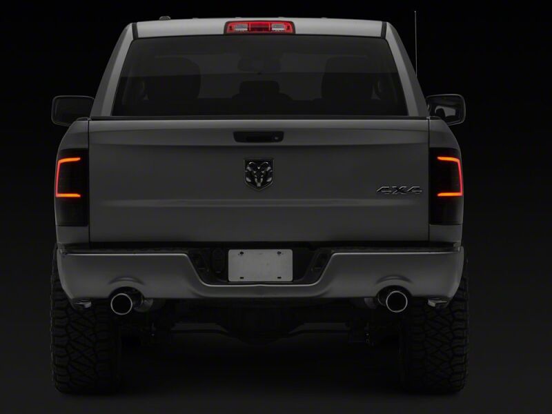 Raxiom 09-18 Dodge RAM 1500 Axial Series LED Tail Lights- Black Housing- Smoked Lens - R113540 - close-up view 4