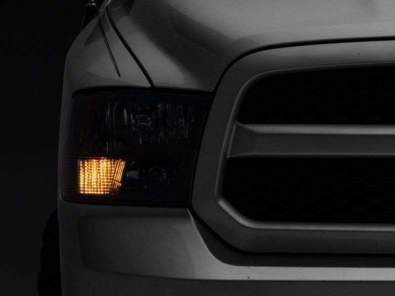 Raxiom 09-18 Dodge RAM 1500 Axial Series Euro Style Headlights w/ Dual Bulb Blk Housing (Clear Lens) - R118016
