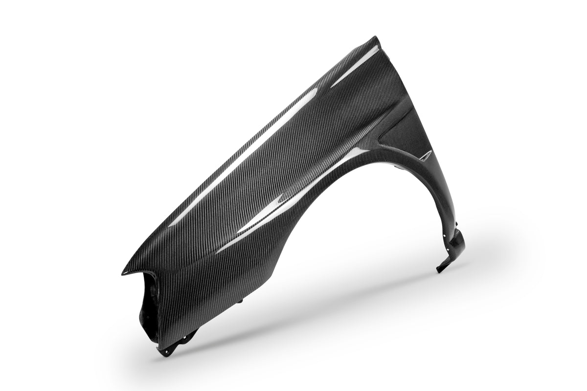 Seibon 04-05 Subaru WRX/STi 10mm Wider Carbon Fiber Fenders - FF0405SBIMP
