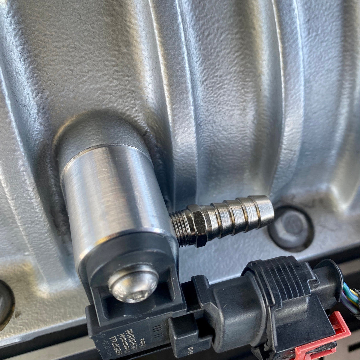 Allows you to add a 1/8 NPT fitting of your choice (not included) for boost refernece.