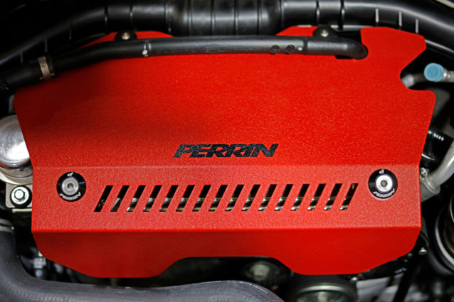 PERRIN Pulley Cover installed with an aftermarket intercooler
