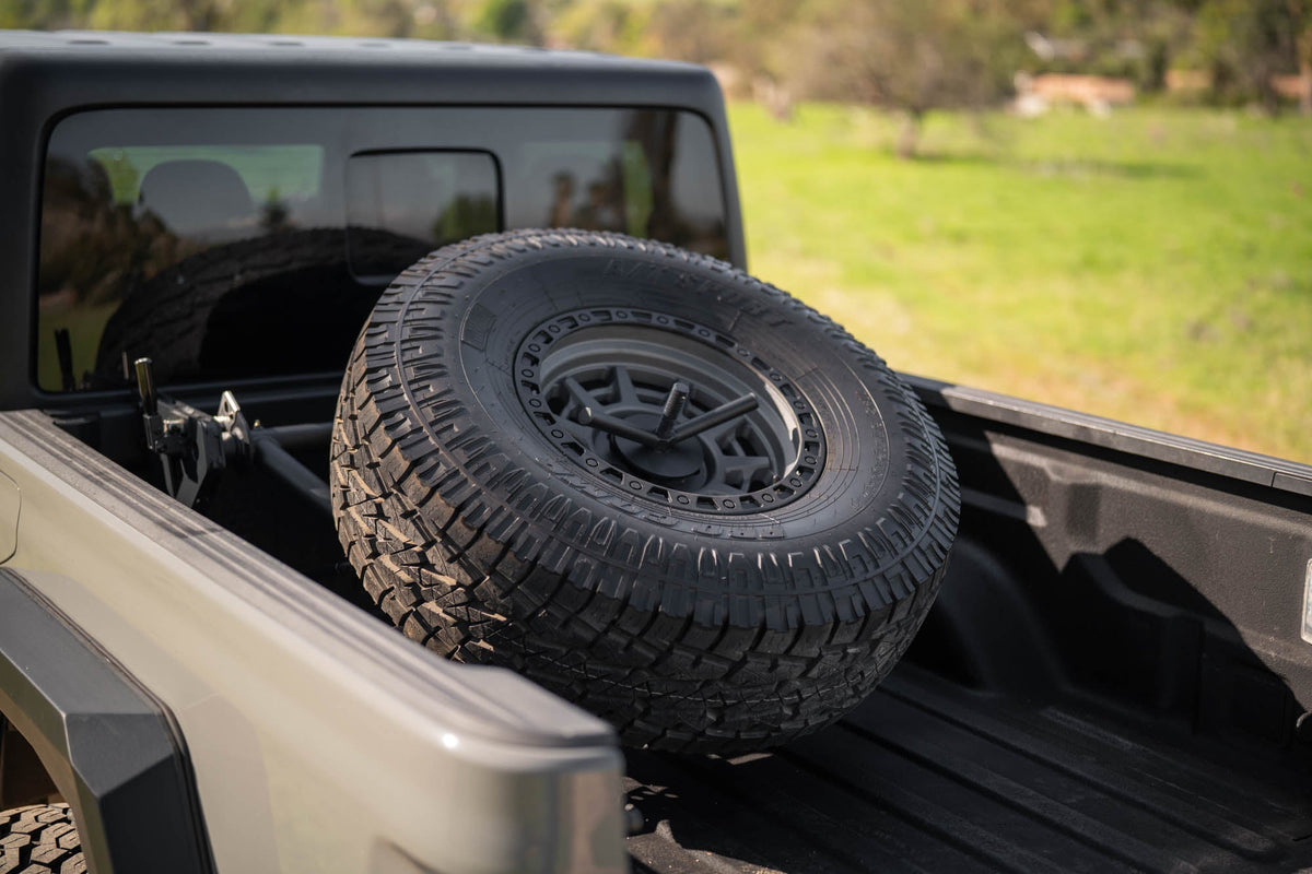DV8 Offroad - 2020-2025 Jeep Gladiator JT Adjustable In-Bed Spare Tire Carrier - TCGL-03