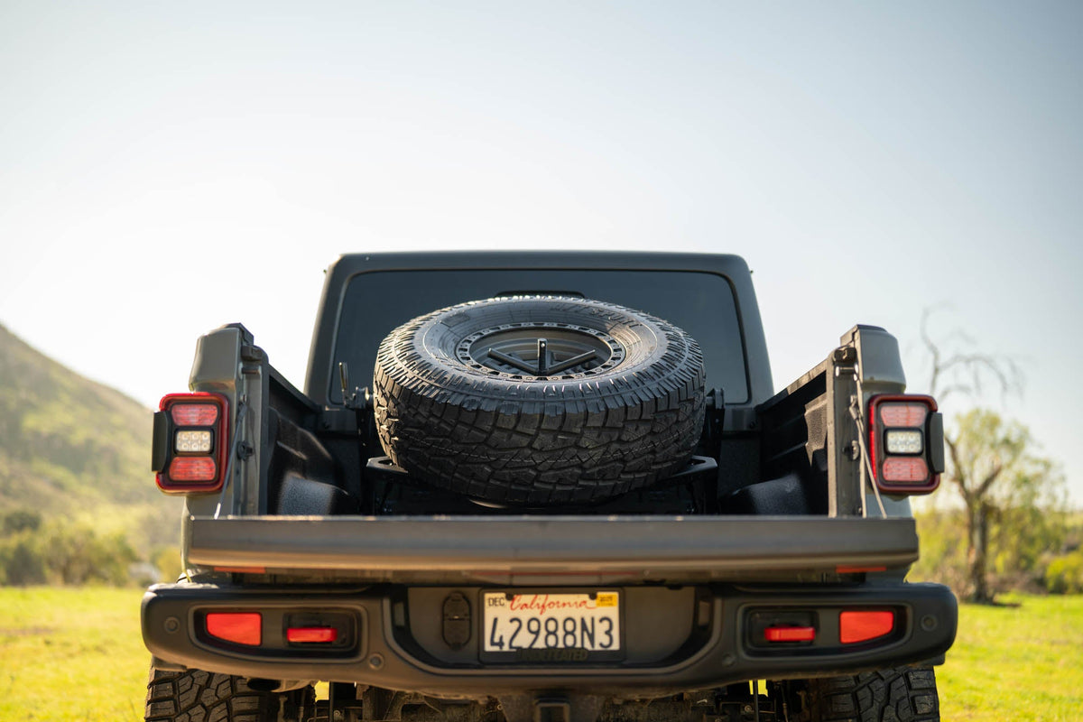 DV8 Offroad - 2020-2025 Jeep Gladiator JT Adjustable In-Bed Spare Tire Carrier - TCGL-03