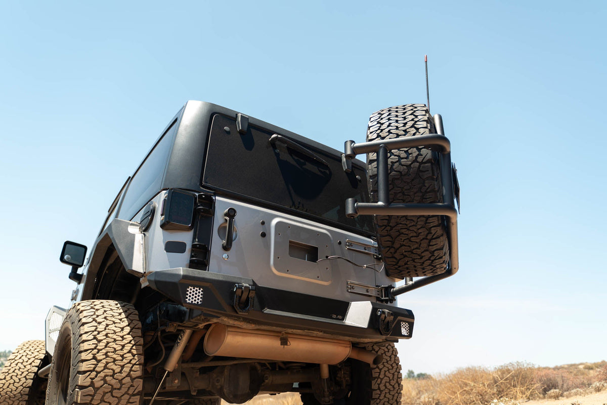 DV8 Offroad - 2007-2018 Jeep Wrangler JK | Body Mounted Tire Carrier - TCJK-14