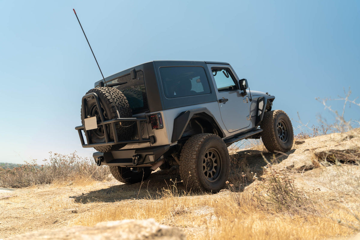 DV8 Offroad - 2007-2018 Jeep Wrangler JK | Body Mounted Tire Carrier - TCJK-14