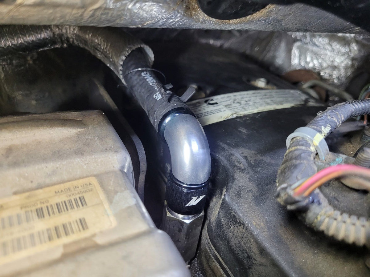 Mishimoto 2007.5+ Ram 6.7L Cummins Top Heater Hose Upgrade - MMHOSE-RAM-07HU for 2007-2010 Dodge Ram 2500 - side view