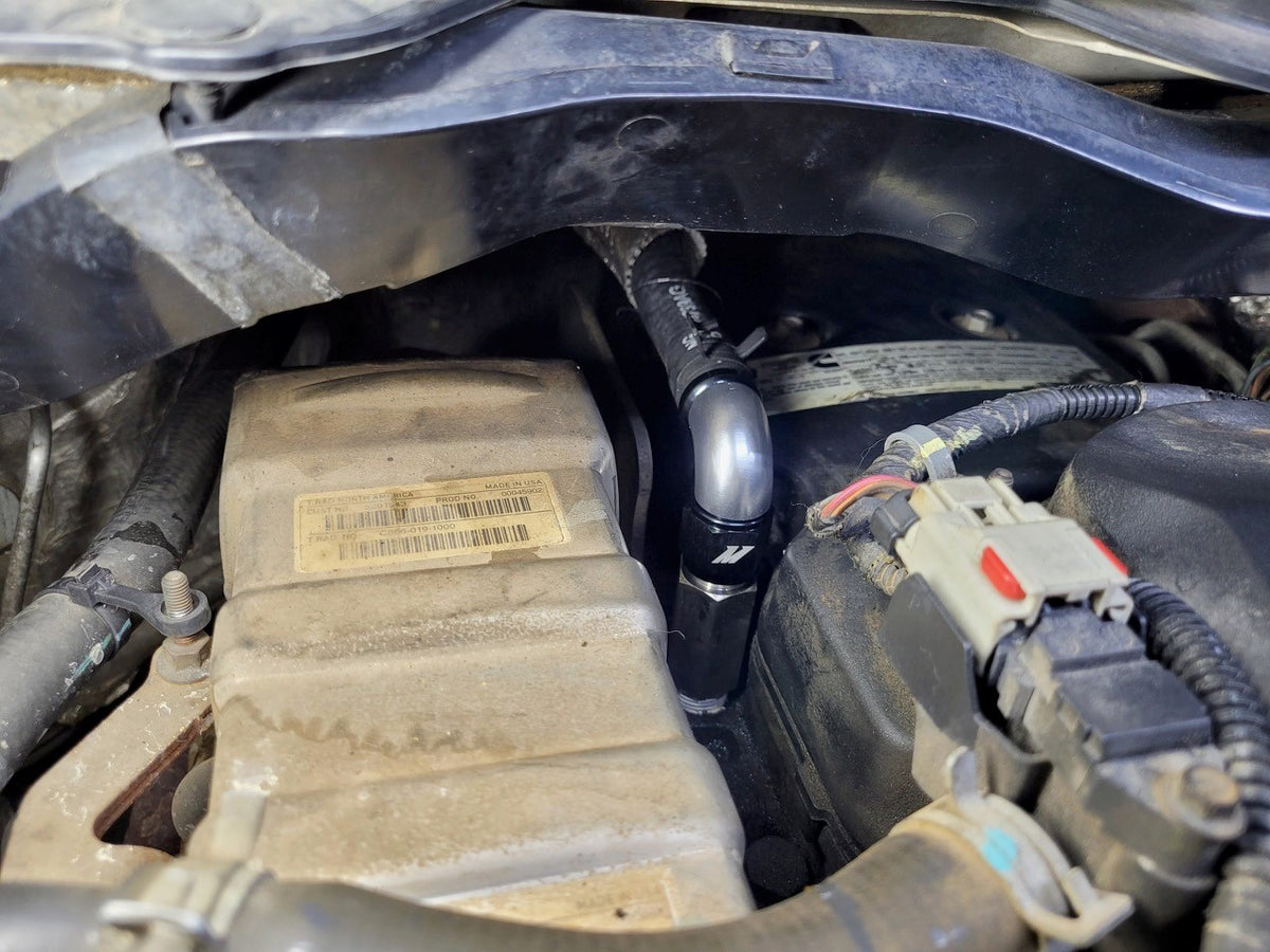 Mishimoto 2007.5+ Ram 6.7L Cummins Top Heater Hose Upgrade - MMHOSE-RAM-07HU for 2007-2010 Dodge Ram 2500 - rear view