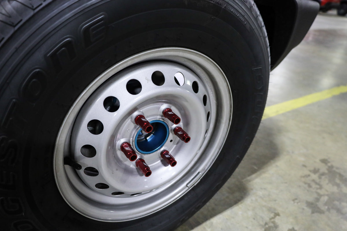 Mishimoto Aluminum Locking Lug Nuts M12x1.5 27pc Set Red - MMLG-15-27LRD for 2021-2026 Ford Bronco - installed view