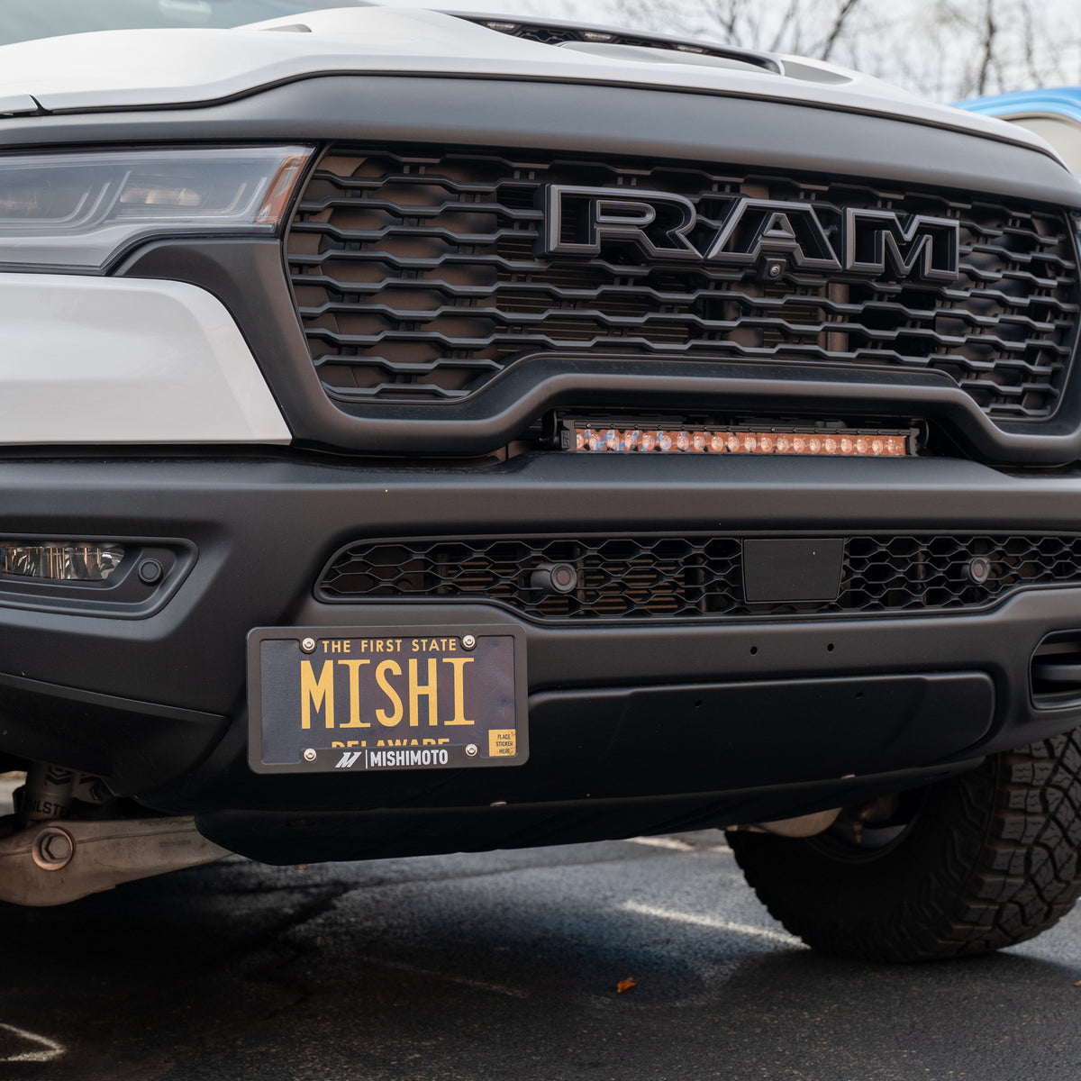 Mishimoto 2025+ Dodge RAM 1500 License Plate Relocation Kit - MMLP-RAM-25 for 2025-2026 Ram 1500 - side view