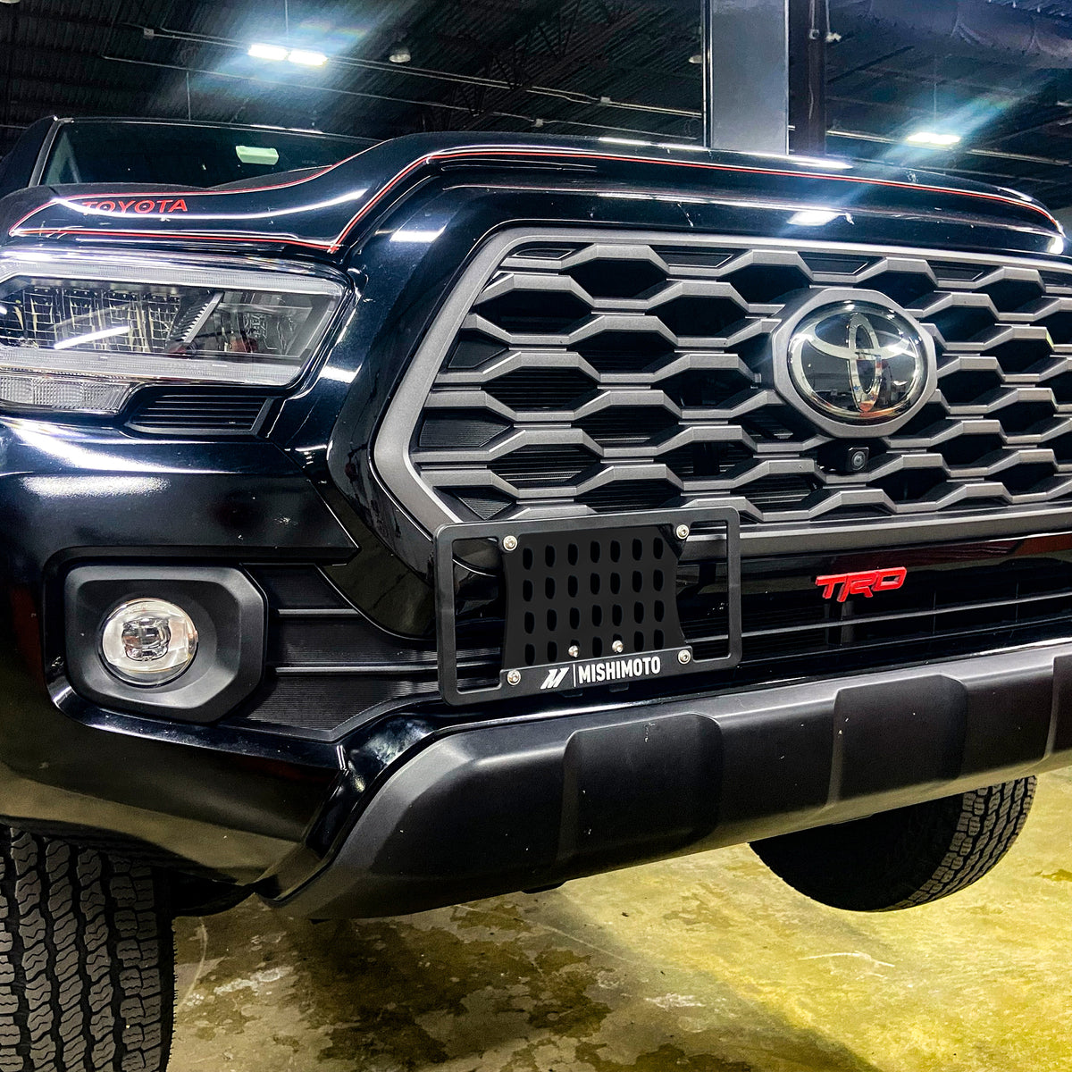 Mishimoto 16-23 Toyota Tacoma License Plate Relocation Kit - MMLP-TAC-16 for 2016-2023 Toyota Tacoma - side view
