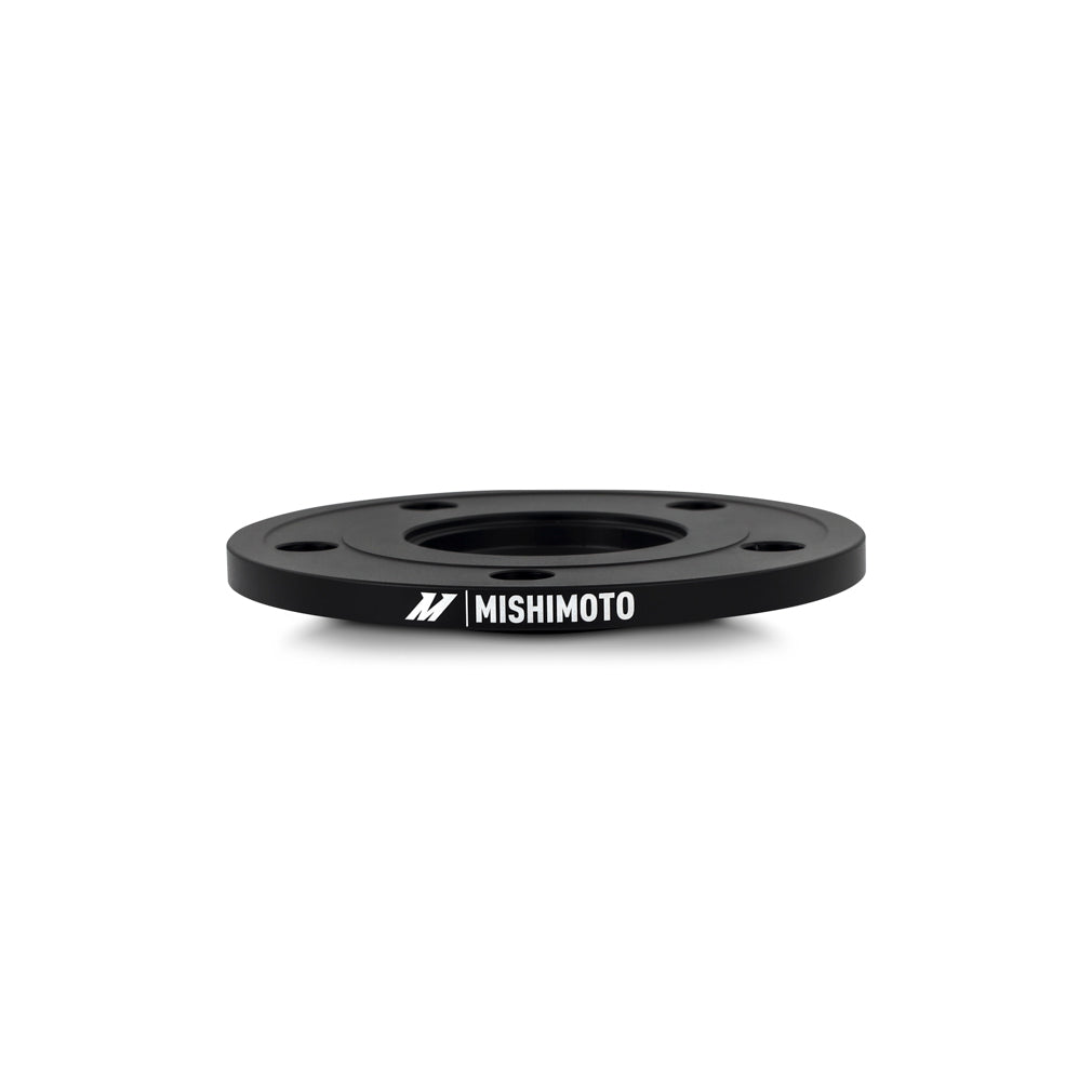Mishimoto Wheel Spacers - 5x120 - 64.1 CB - M14 x1.5 - 15mm - BK - MMWS-013-150BK for 2005-2024 Honda Odyssey - angle view
