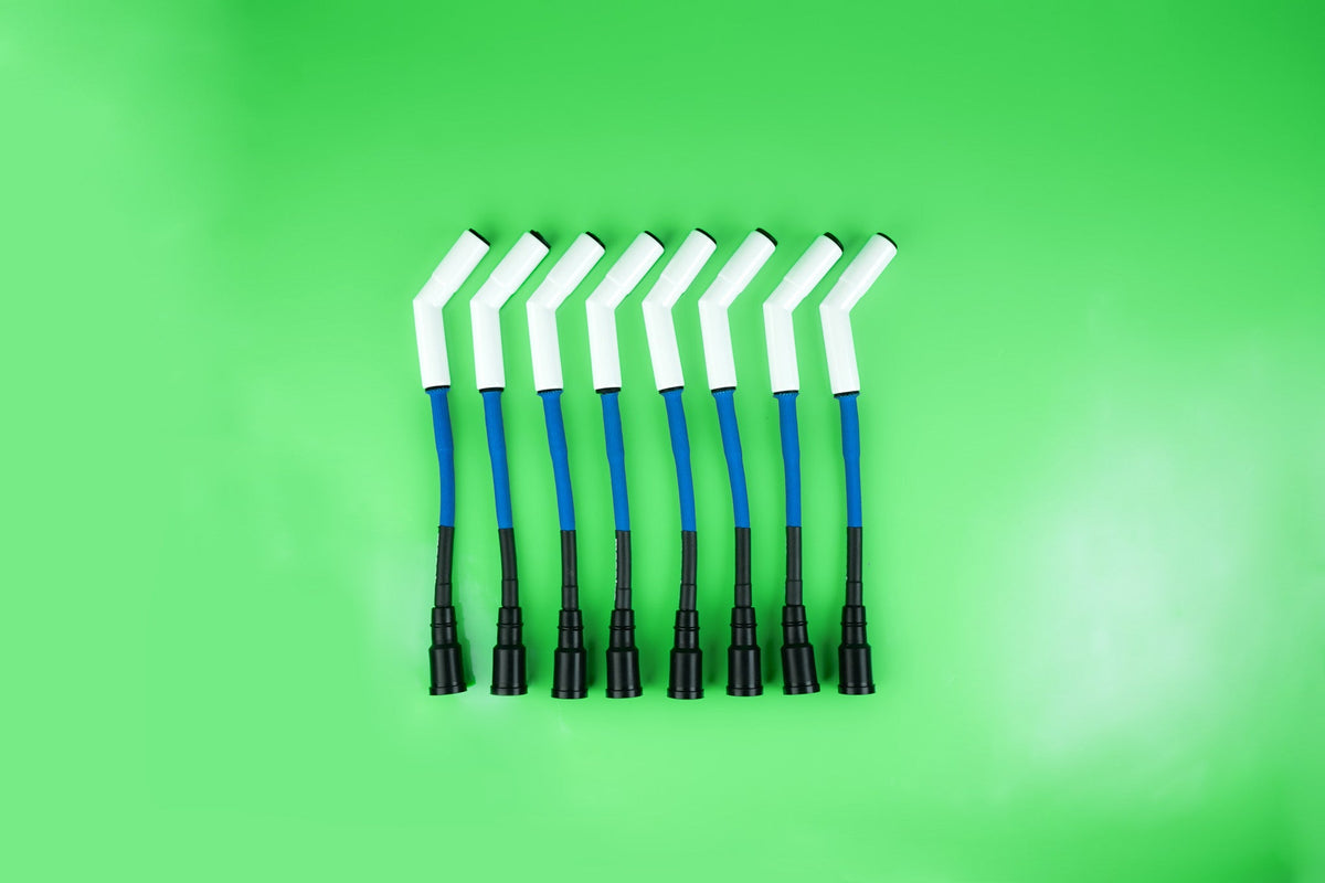 Massive Xeramik Spark Cables Plug Wires blue green background